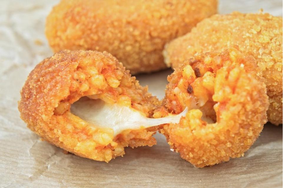 Arancini o arancine? La storia del piatto siciliano per eccellenza!