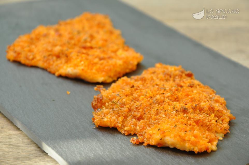 Filetti di pesce gratinato ai pomodori secchi