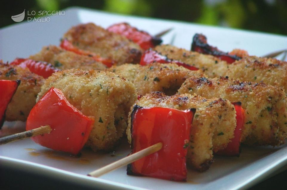 Spiedini di pollo arrotolato