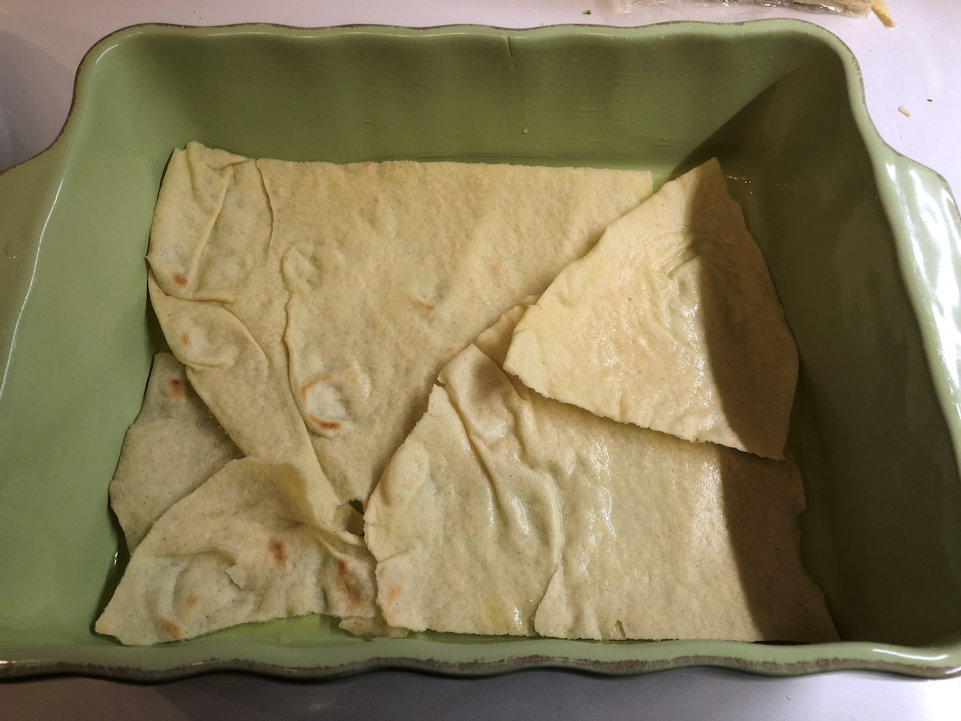 Pane Carasau sul fondo della teglia