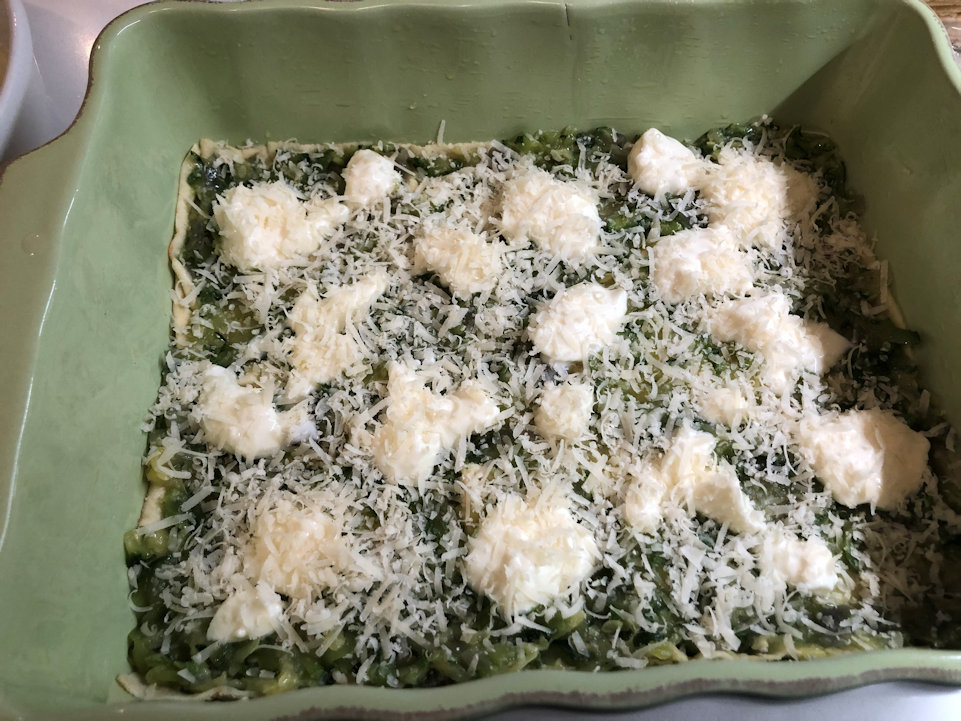 Parmigiano sopra lo stracchino per completare